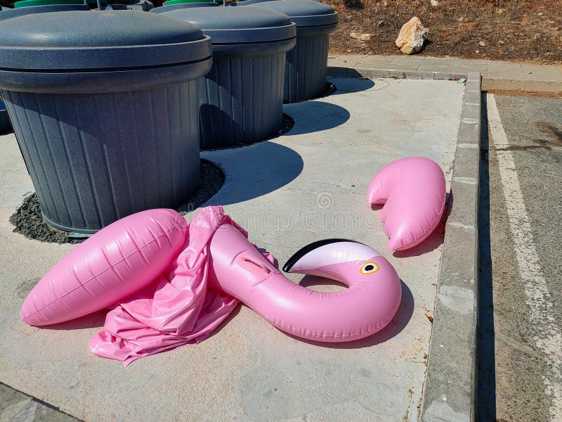 Deflated Swimming Pool Toy Neat Trash Can Stock Image