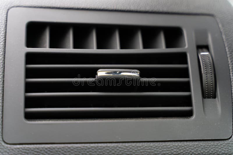 The Deflector on the Grey Panel of the Car. Car Heating and Air Conditioning System Stock Photo