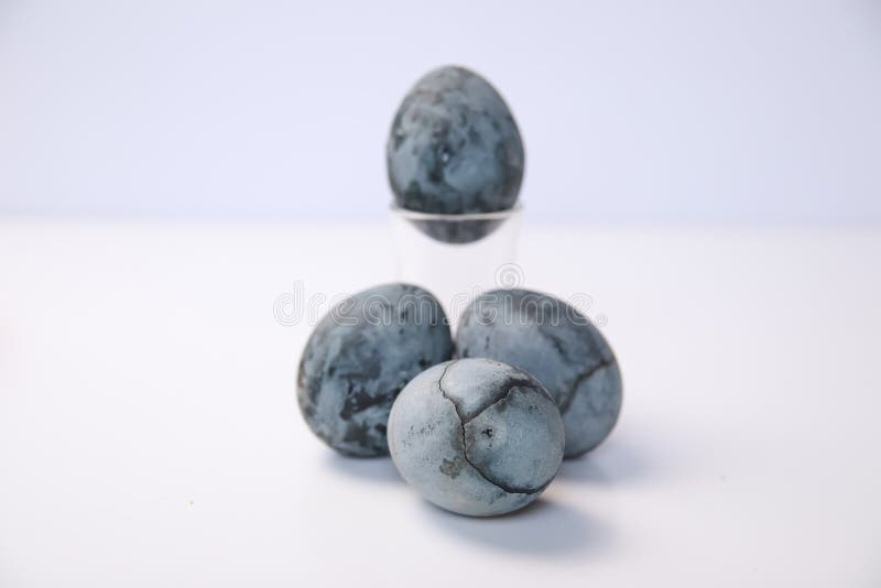 Defocus Blue Eggs. Close Up Easter Eggs Pastel Colored on White