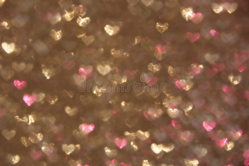 Defocused abstract hearts light background