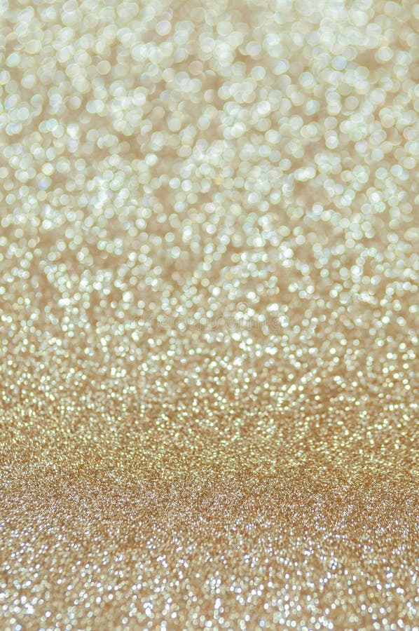 Defocused abstrakt blek guld tänder bakgrund arkivfoto Defocused abstrakt blek guld tänder bakgrund arkivfoto