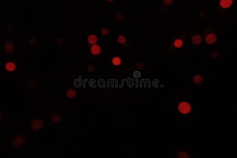 Defocused Bokeh Red Small Lights on Black Background. Blurred Abstract Red  Glitter Wallpaper Stock Image - Image of blurred, light: 205363989