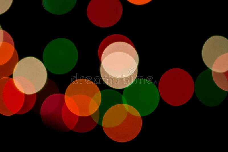 Defocused Christmas Lights. Abstract Bokeh Background. Colorful Light Circles