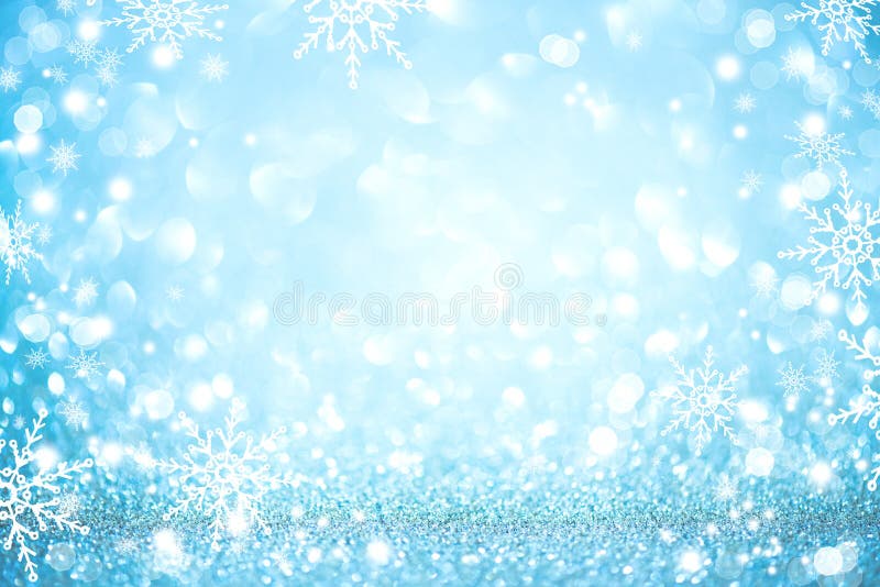 Blue Christmas holiday glowing defocused background. Blue Christmas holiday glowing defocused background