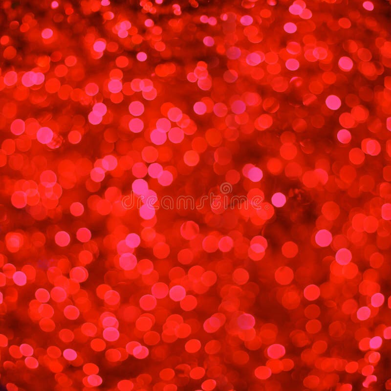 Defocused red abstract christmas background with bokeh effect