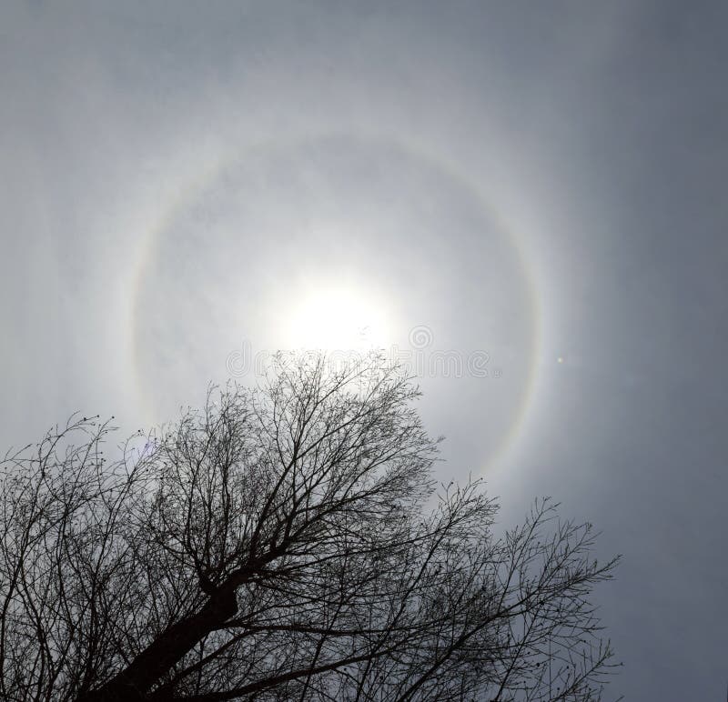 22 degree halo and moon stock photo. Image of meteorology 37689816