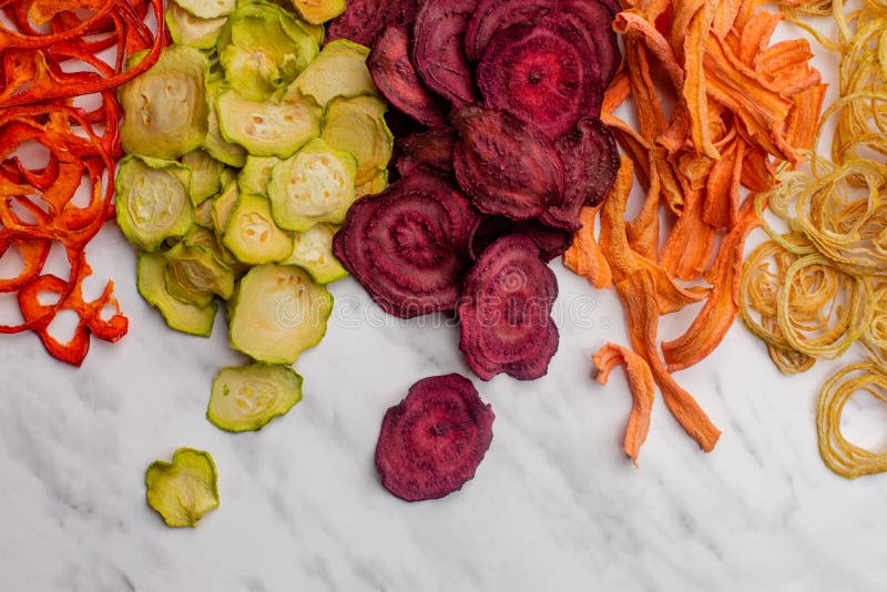 Dehydrated Vegetables Heap Isolated on White As a Snack for Vegetarians