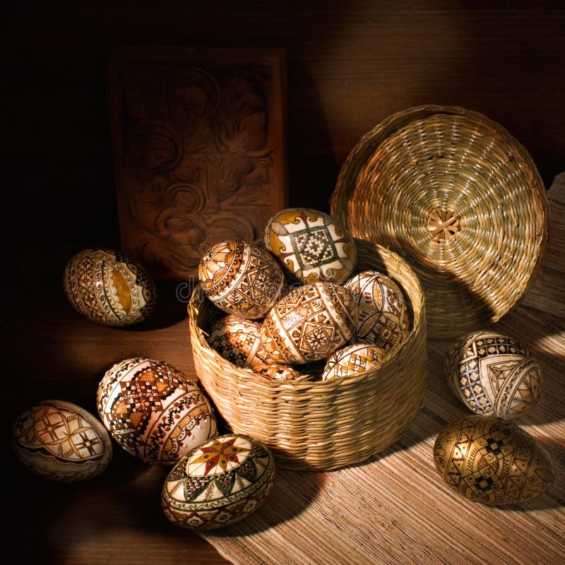 Handmade brown romanian decorated easter egg still-life. Handmade brown romanian decorated easter egg still-life