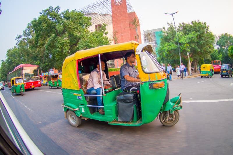 DELHI, INDIA - SEPTEMBER 19, 2017: Autorickshaw Yellow and Green in the