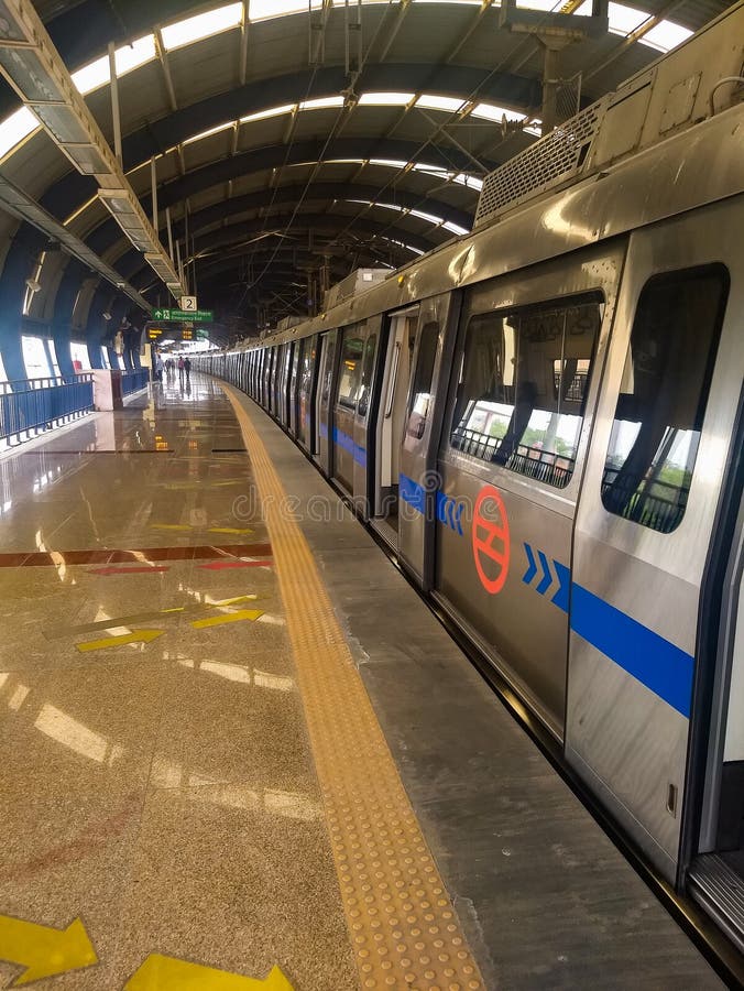 Delhi Metro Train Arriving at Jhandewalan Metro Station in New Delhi