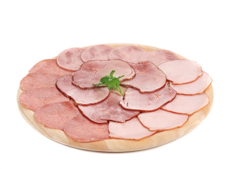 Deli meat on wooden platter.