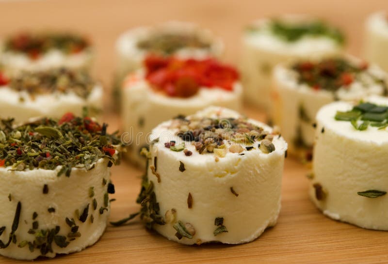 White cheese delicacy on bamboo board. White cheese delicacy on bamboo board