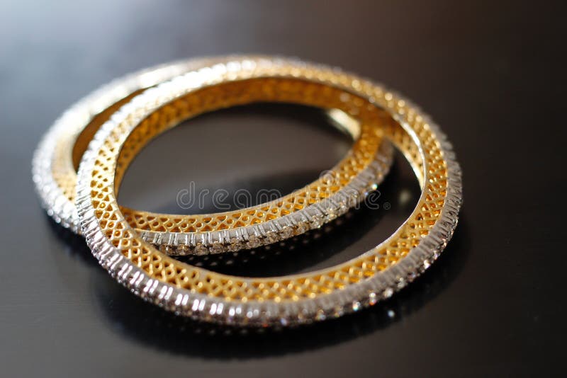 Pretty traditional geometric pattern golden bangles