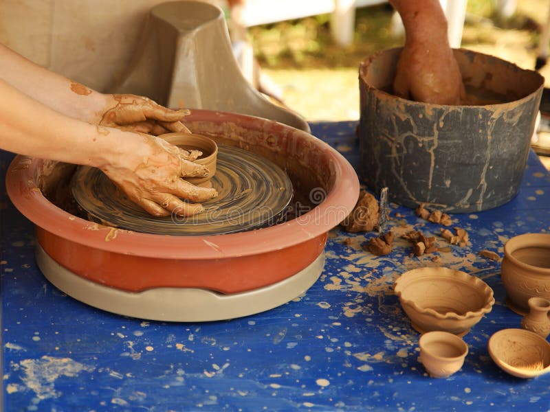 Classic Making a Pottery Bowl on the Pottery Wheel Stock Photo