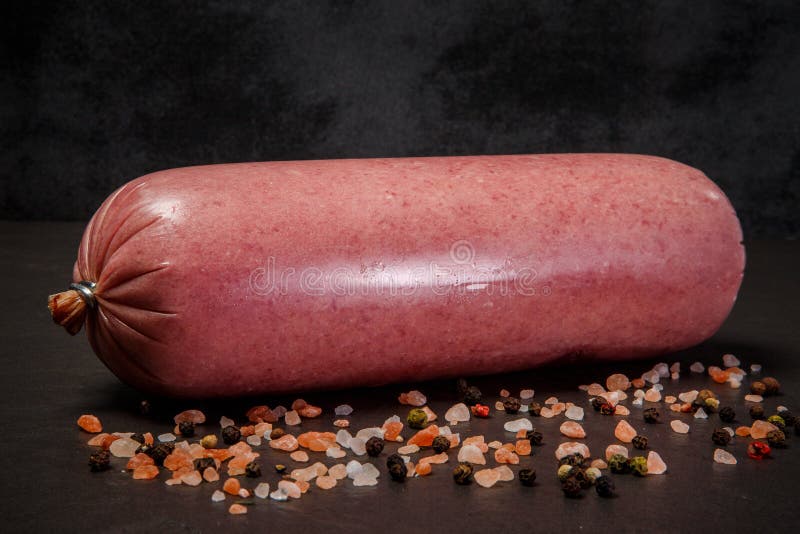 delicatessen-beef-sausage-served-big-thick-stick-spices-delicatessen-beef-sausage-served-big-thick-stick-pink-salt-153689876.jpg