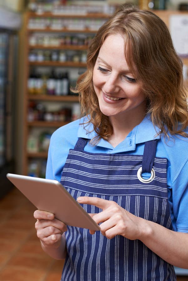 Delicatessen Owner in Store with Digital Tablet Stock Photo Image of