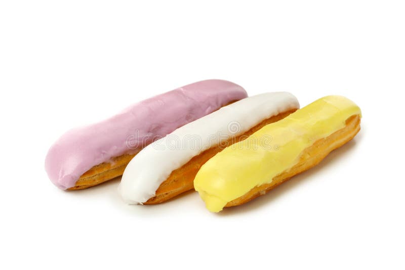 Deliciosos eclairs con crema aislada en fondo blanco imágenes de archivo libres de regalías