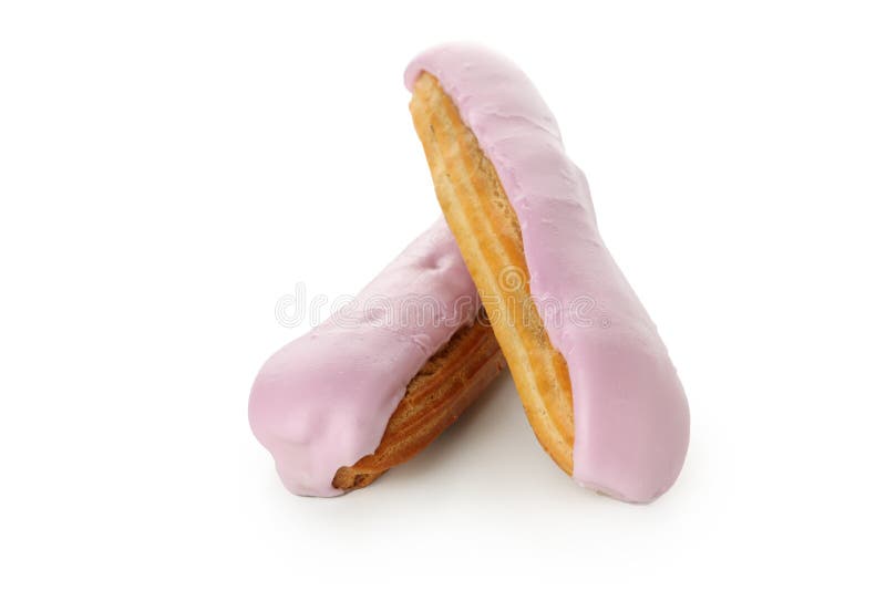 Deliciosos eclairs con natillas aisladas sobre fondo blanco fotos de archivo libres de regalías