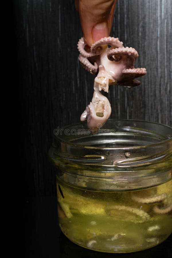 Delicious Appetizer - Marinated Baby Octopus with Oil Stock Photo ...