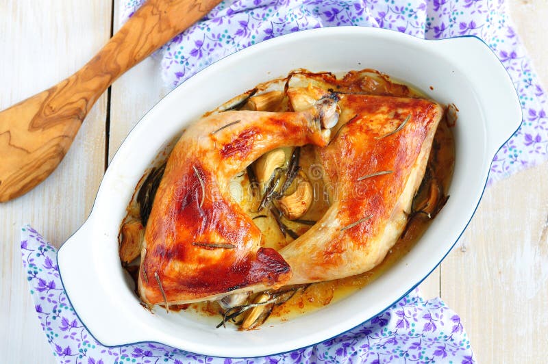 Delicious baked chicken with rosemary and garlic sauce