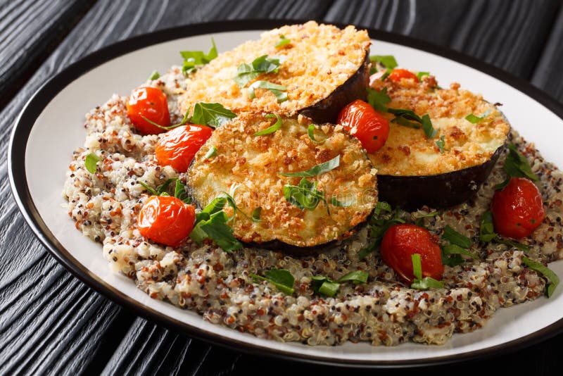 Delicious Baked Eggplant Served with Multicolored Quinoa Closeup on a
