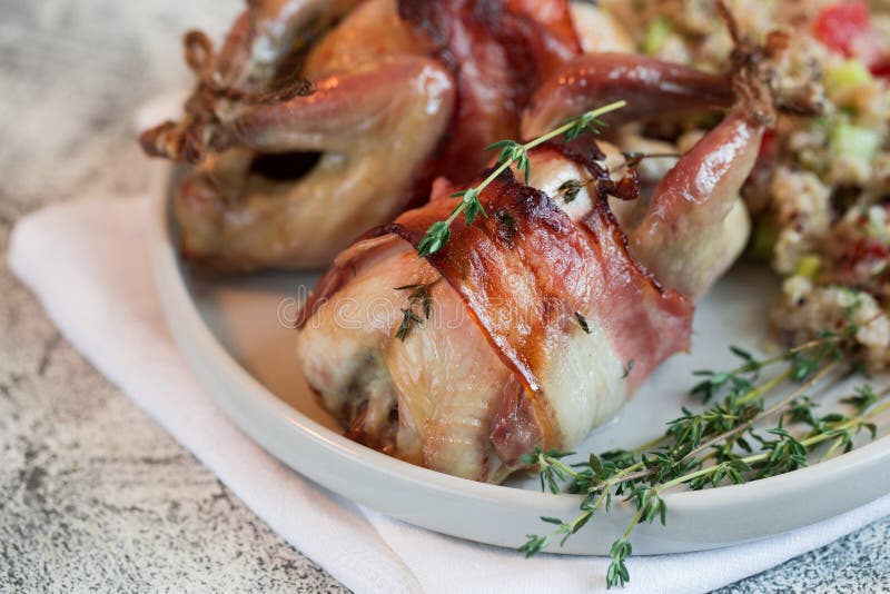 Delicious Baked Quail with Bacon and Side Dish Stock Image Image of