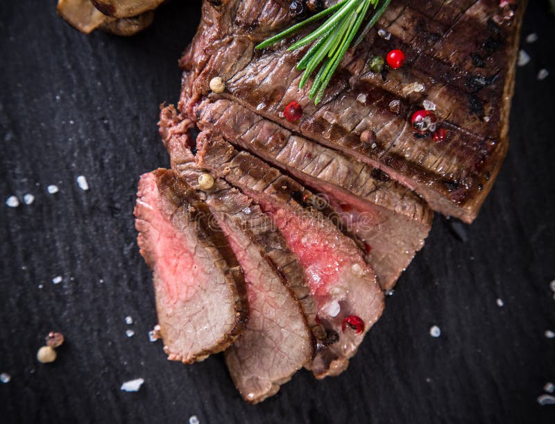Beef steak on the grill. stock photo. Image of flames - 65211706