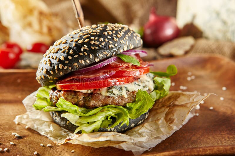 Delicious Black Burger stock image. Image of menu, american - 98514543