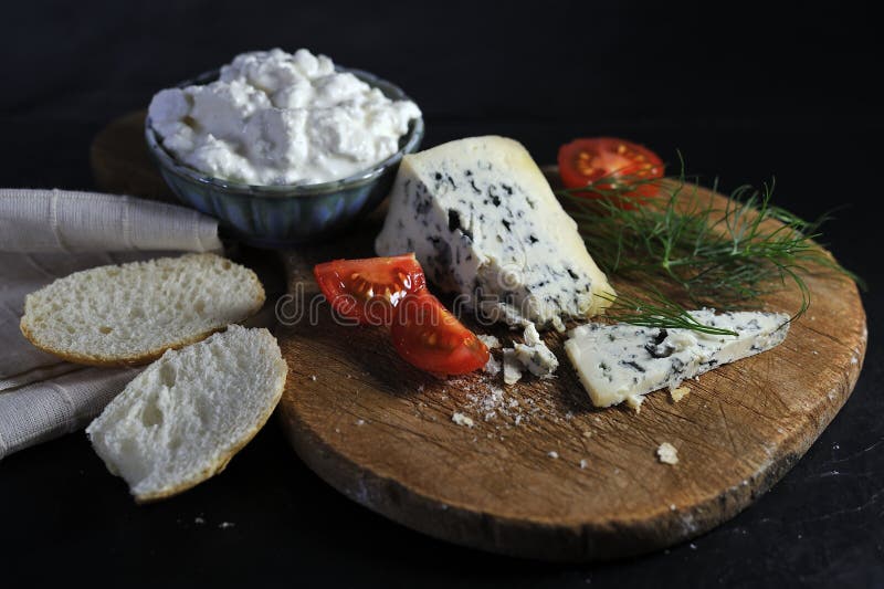 delicious blue cheese on a wooden board royalty free stock images delicious blue cheese on a wooden board royalty free stock images