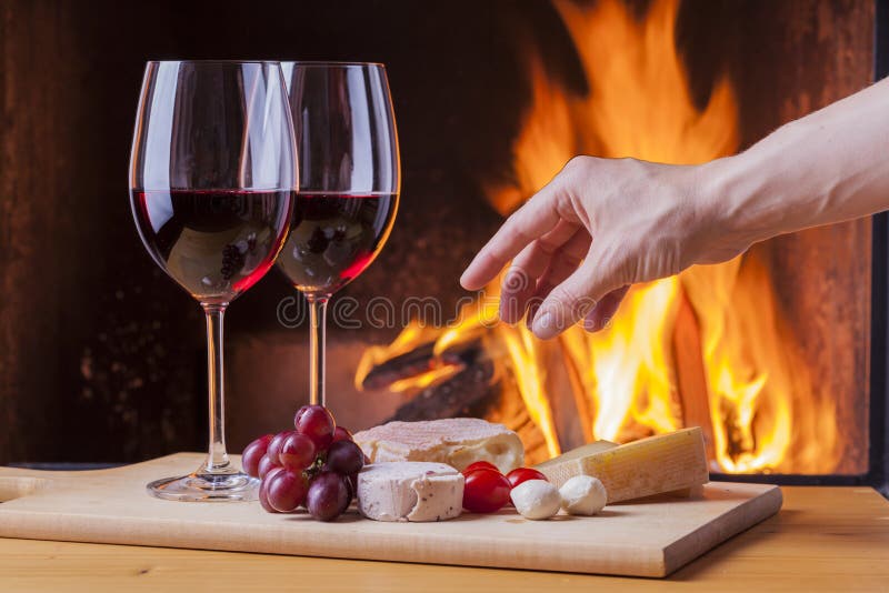 Fireplace and Red Wine stock image. Image of liquor, dish 1728139