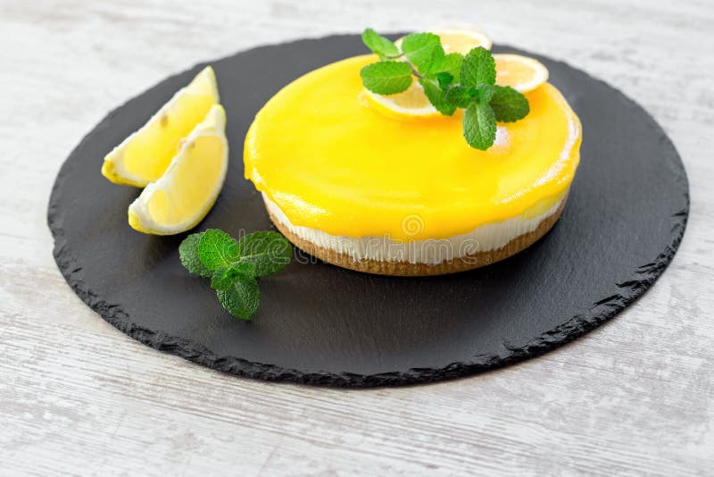 Delicious Cheesecake, Creamy Lemon Cheesecake on Rustic Plate on Rustic