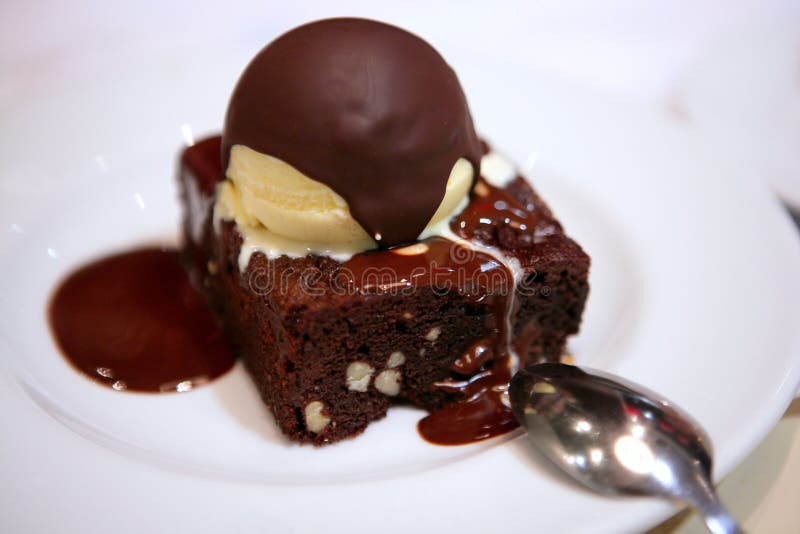 Delicious chocolate brownie and ice cream stock images