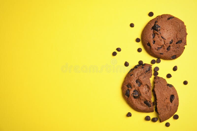 Delicious Chocolate Chip Cookies on Color Background, Flat Lay Stock Photo Image of brown