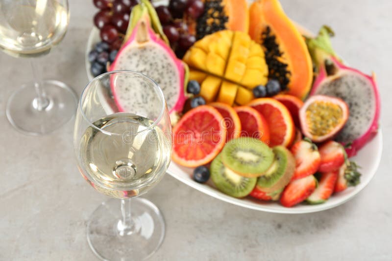 Delicious Exotic Fruits and Wine on Grey Table Stock Image Image of