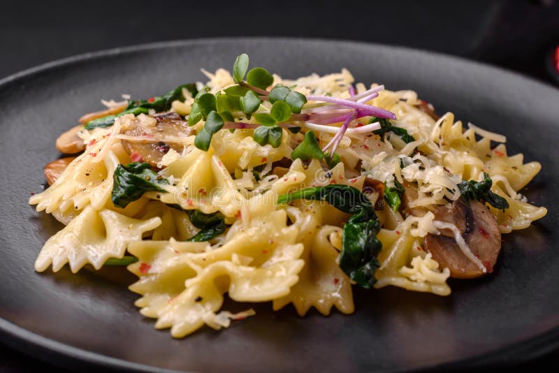 Delicious Farfalle Pasta with Mushrooms, Cheese and Spinach with Spices