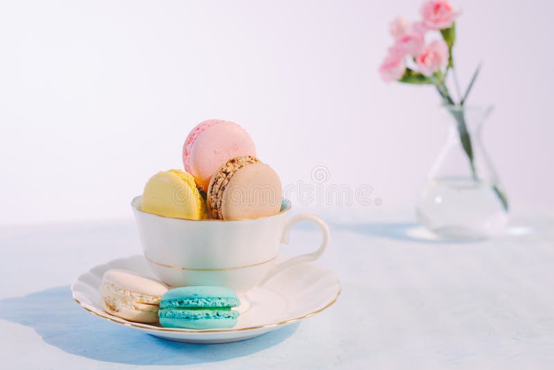 Delicious french dessert. Colorful pastel cake macaron or macaroon stock photos Delicious french dessert. Colorful pastel cake macaron or macaroon stock photos