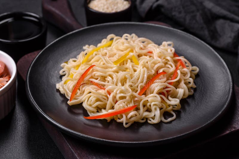 Delicious Fresh Rice Noodles with Shrimp, Spices and Herbs Stock Photo