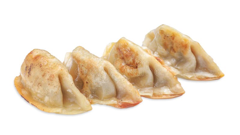 Delicious fried gyoza dumplings isolated on white fotos de archivo
