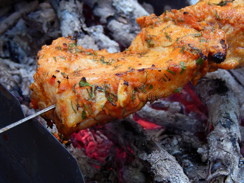 Delicious Fried Shish Kebab with Vegetables on a Spit Stock Photo