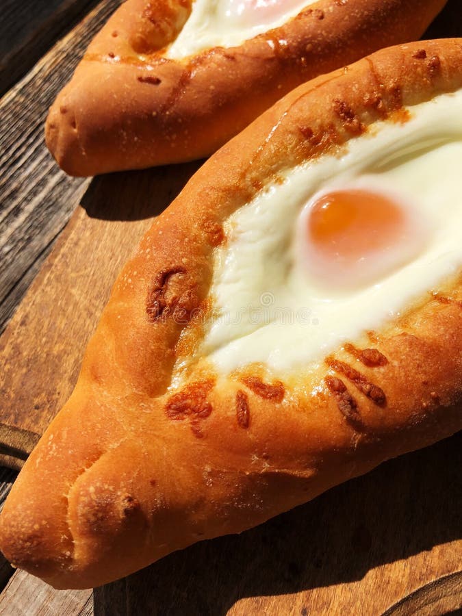 Delicious Georgian bread with egg and cheese stock image Delicious Georgian bread with egg and cheese stock image