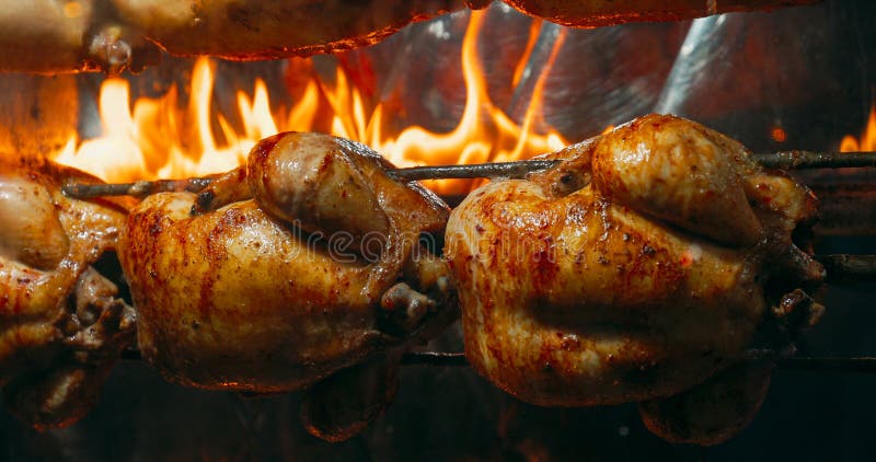 Delicious Golden Brown Rotisserie Chickens Turn On Spit. Tasty G