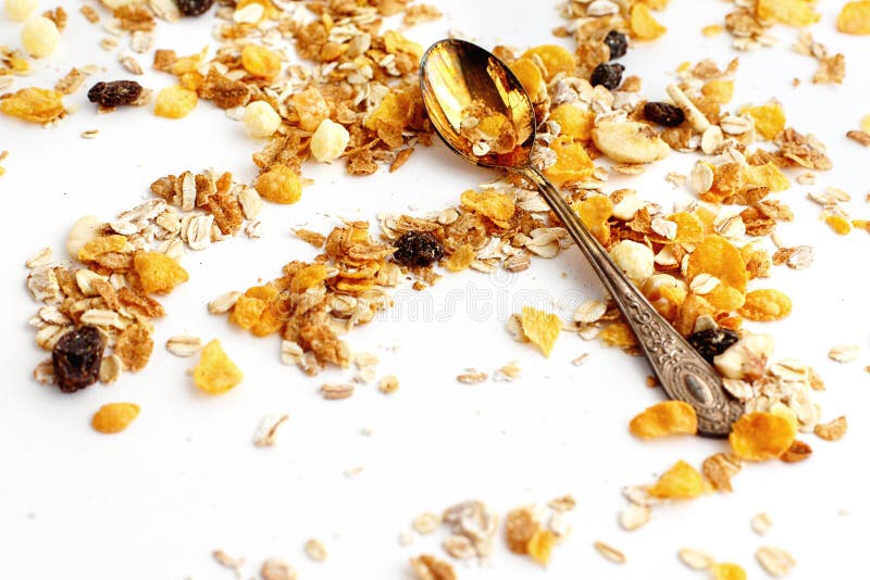 Delicious Granola Muesli Cereal With Vintage Spoon On White Back