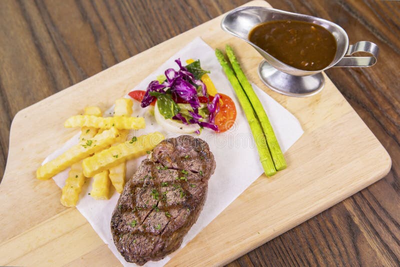 Delicious grilled beef steak on table royalty free stock images Delicious grilled beef steak on table royalty free stock images