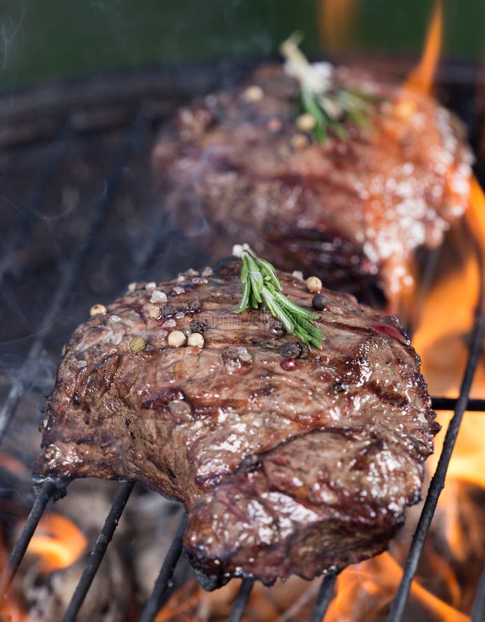 Delicious Grilled Beef Steaks on a Barbecue Grill. Stock Image Image