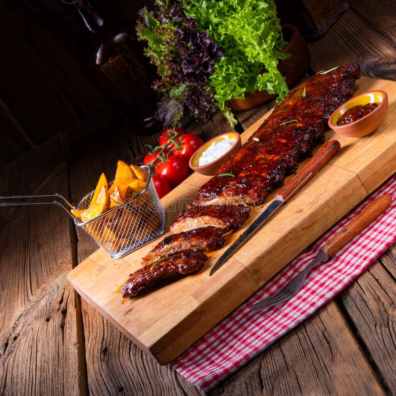 Delicious Grilled Ribs with Barbecue Barbecue Sauce Stock Photo Image of bones, barbecued
