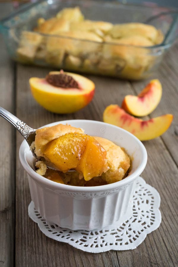 Delicious Homemade Peach Cobbler with ice cream
