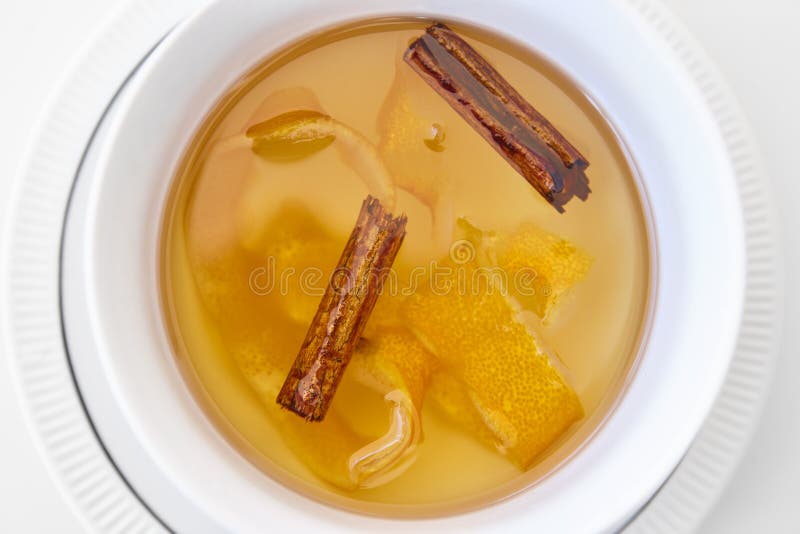 Delicious homemade syrup with cinnamon and lemon peels. Sweet