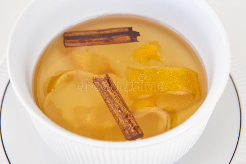 Delicious homemade syrup with cinnamon and lemon peels. Sweet