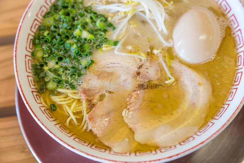 Delicious Japanese Chashu Ramen with Boiled Egg and Vegetable Stock