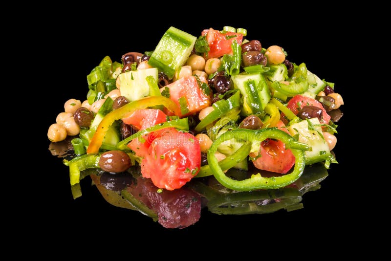 A delicious Mediterranean salad with Chickpeas with reflection stock photo